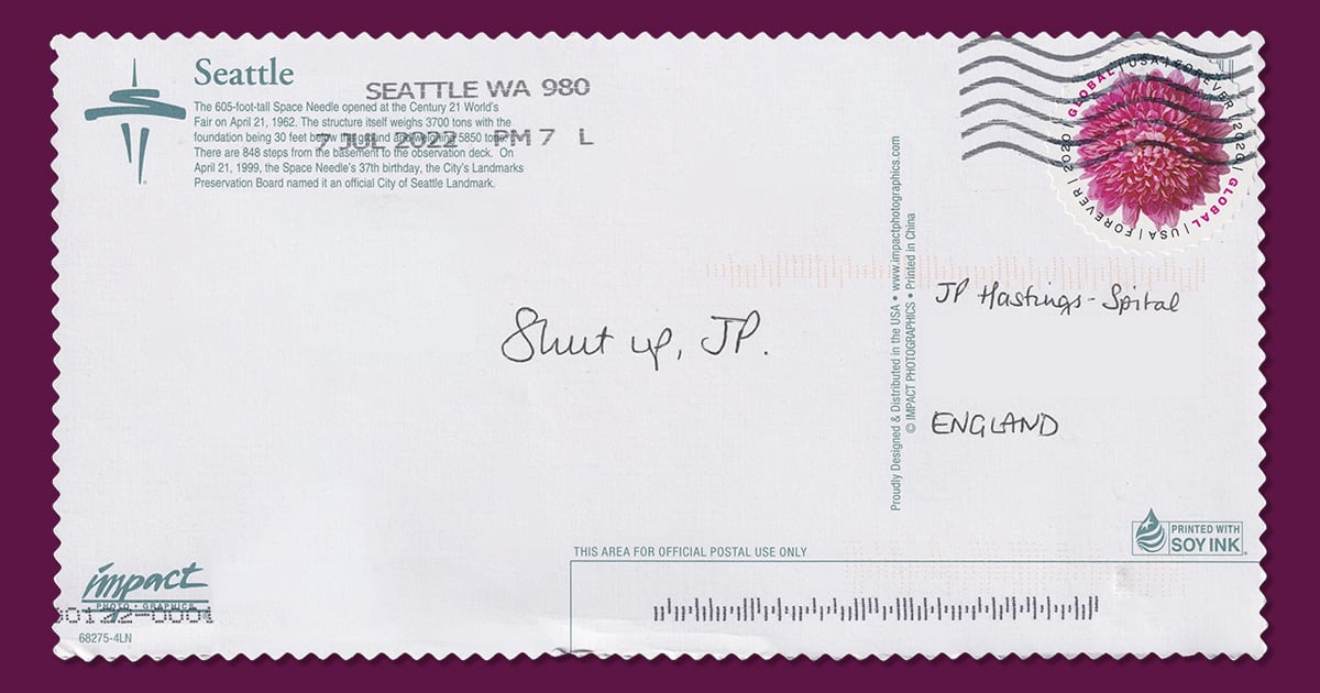 A scan of the back of a postcard, with handwriting sasying "Shut up, JP."